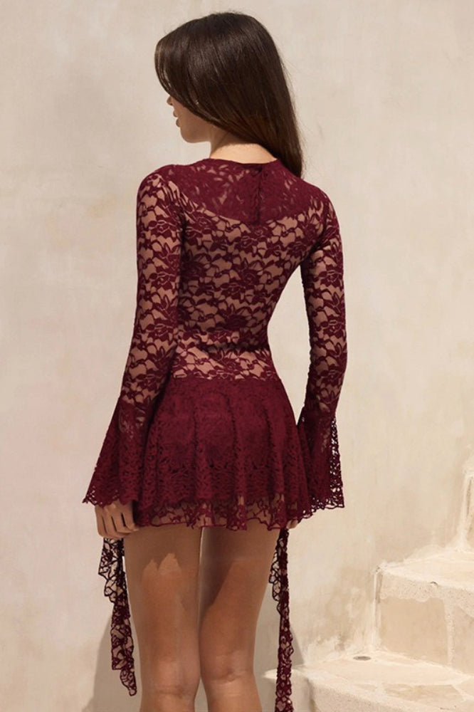 Minivestido de manga larga con lazo y volantes de encaje
