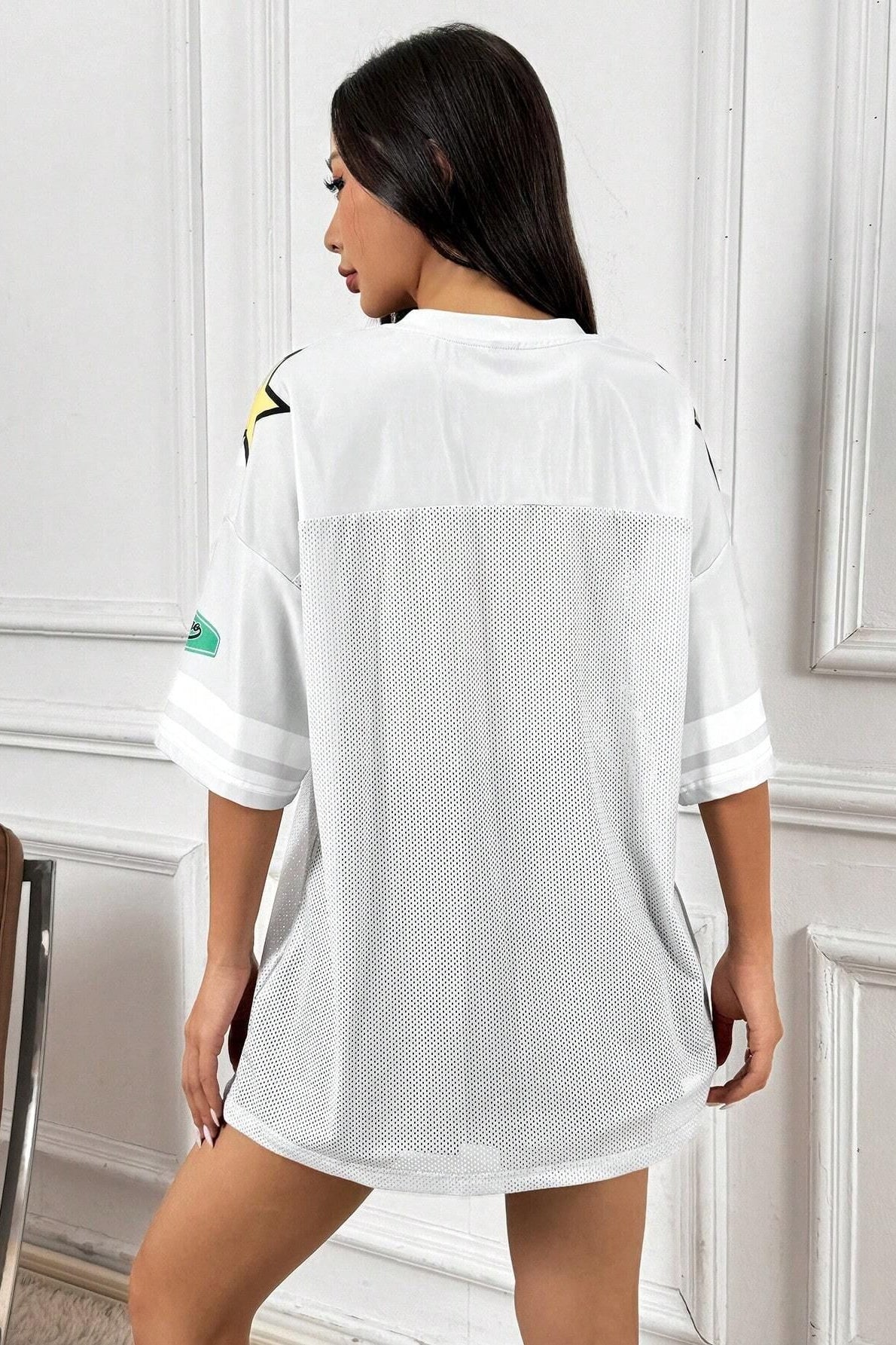 Camiseta deportiva holgada con estampado de bloques de color estilo urbano a la moda