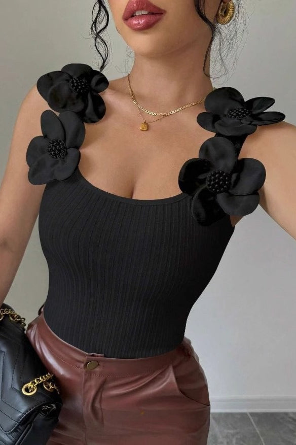 Top de punto con aplique floral
