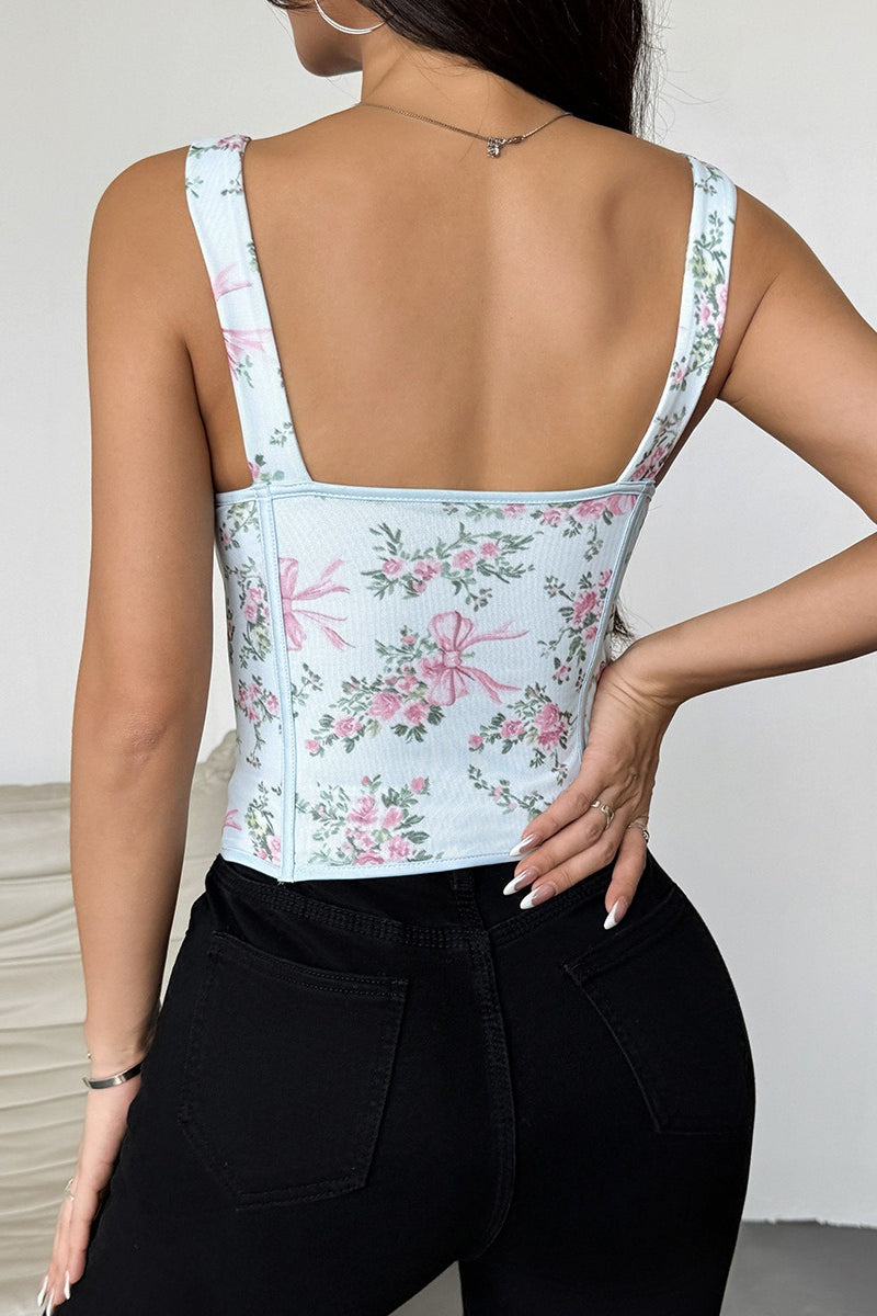 Top corto con estampado floral, varillas, lazo cruzado y lazada