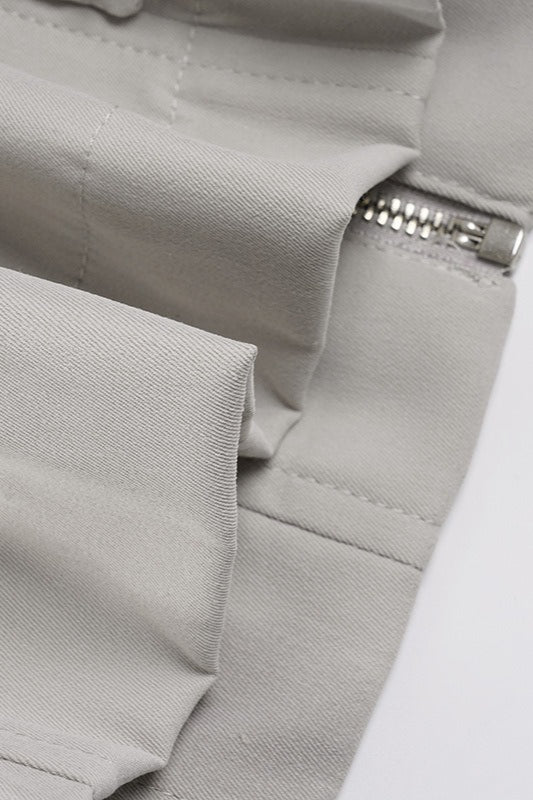 Chaqueta utilitaria de color liso con cremallera