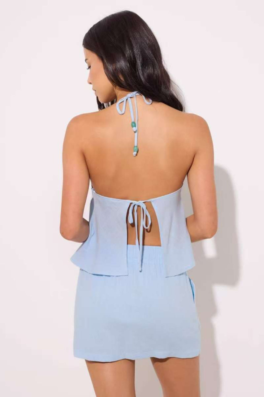 Top halter minimalista sexy con abalorios y color liso