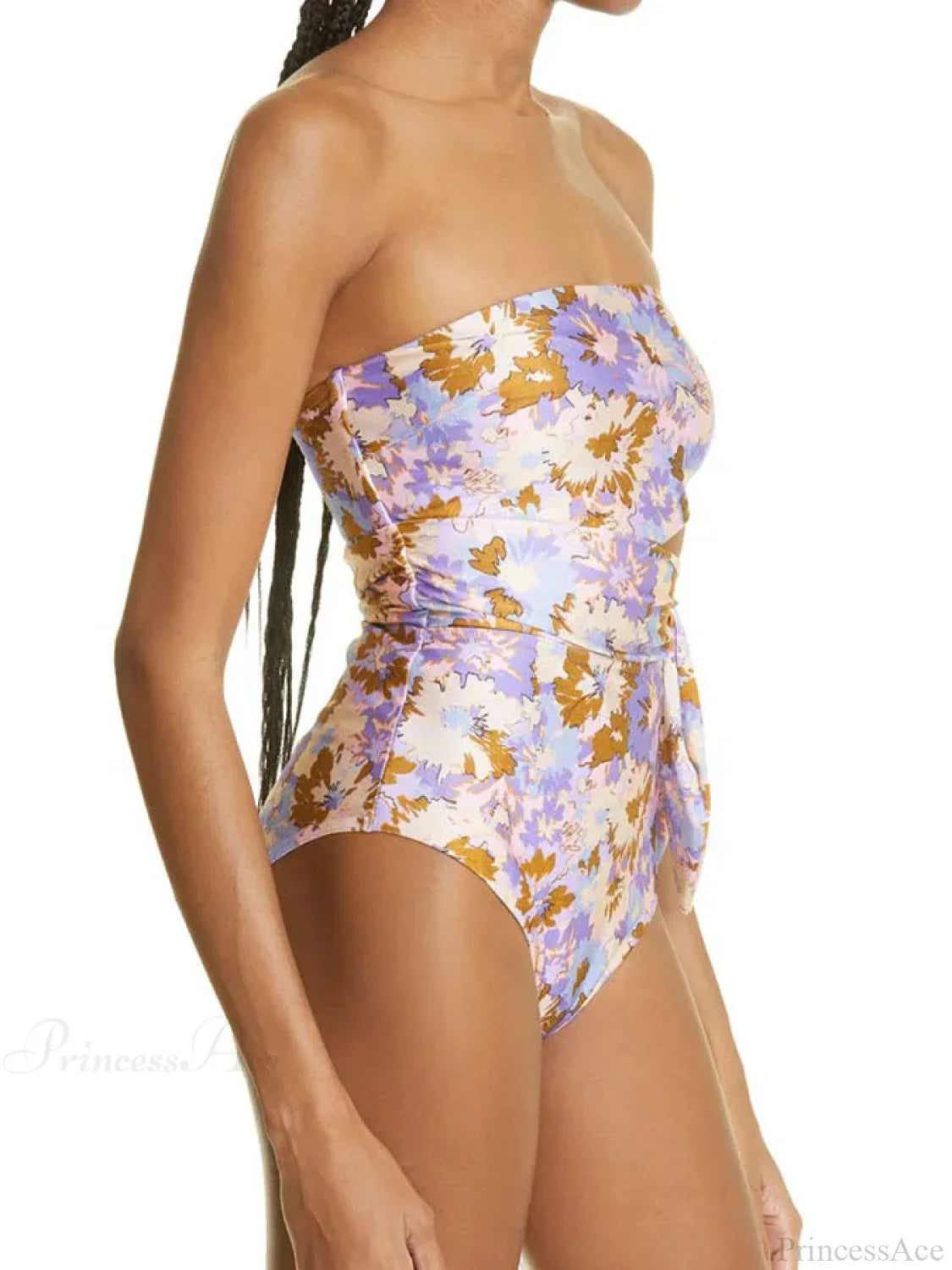 Traje de baño de una pieza con estampado floral morado y amarillo y escote cruzado