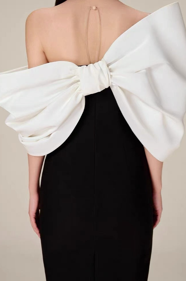 Vestido formal de cintura alta con lazo grande