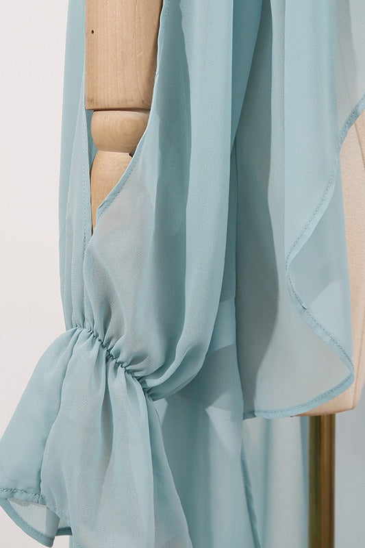 Blusa holgada con cuello irregular y tirantes halter de color liso