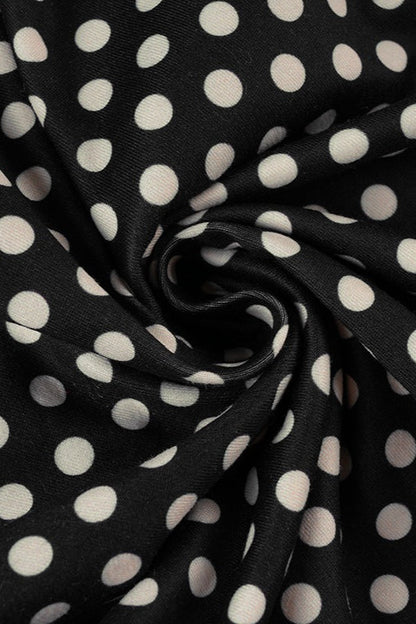 Blusa de encaje con cuello en V profundo y lunares