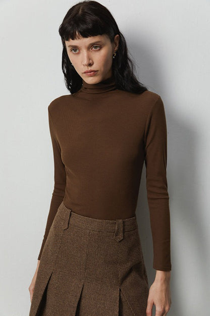 Top de punto elástico térmico con cuello apilado