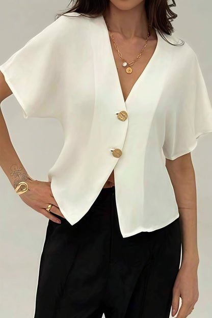 Blusa de manga corta con botones irregulares en la parte delantera