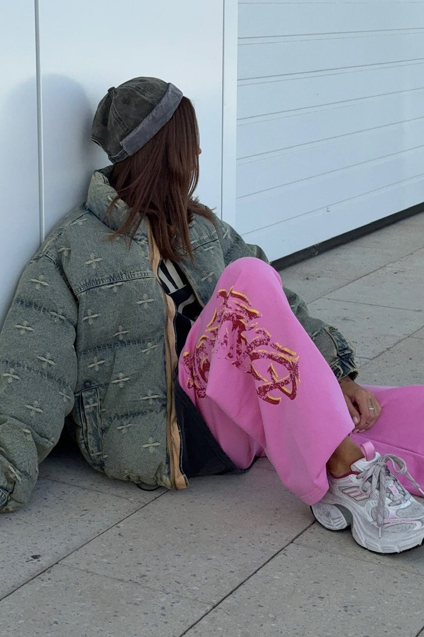 Chaqueta acolchada con bordado de cruz y efecto desgastado vintage