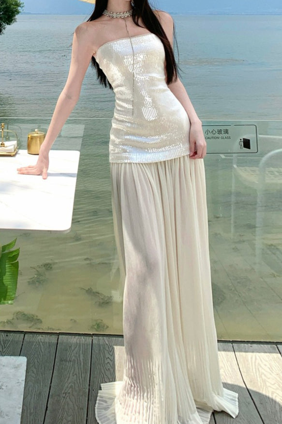 Vestido largo con lentejuelas, sin tirantes y fluido