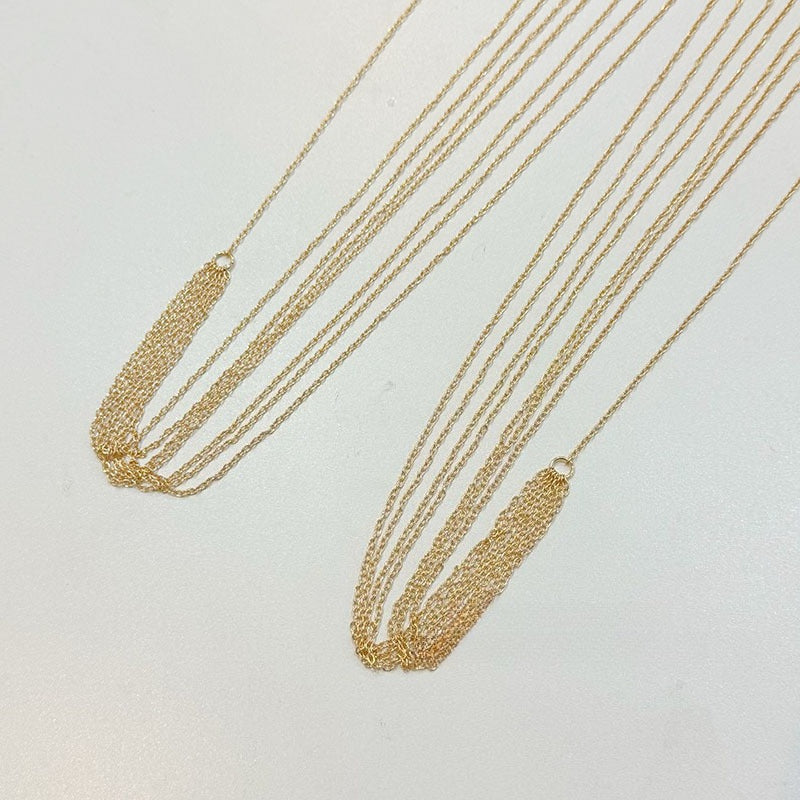 Elegante cadena corporal con borla dorada sexy