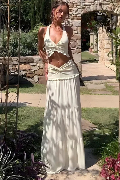 Vestido boho coordinado con escote halter y detalle retorcido, sin mangas
