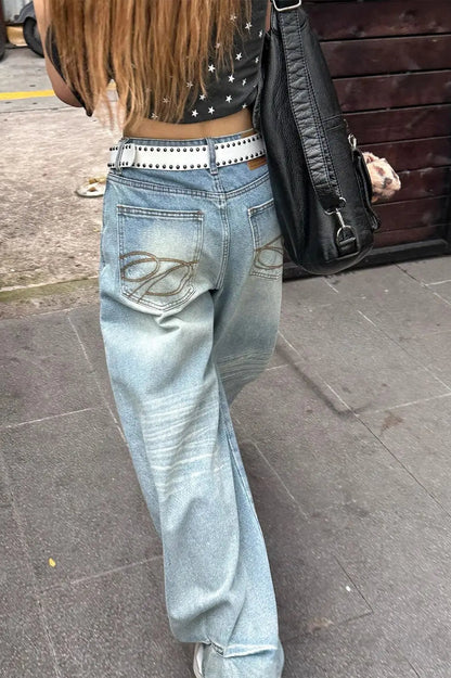 Vaqueros bordados de pierna ancha y tiro alto