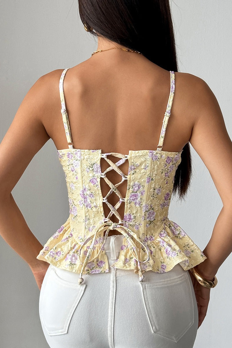 Top de tirantes con volantes irregulares y lazo con estampado floral
