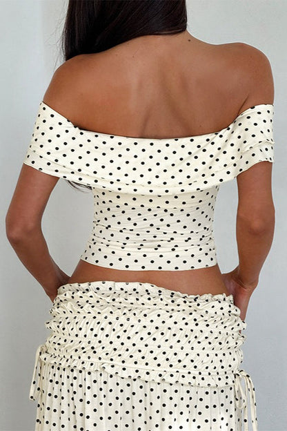 Conjunto de falda larga sin tirantes con lazo lateral y estampado de lunares