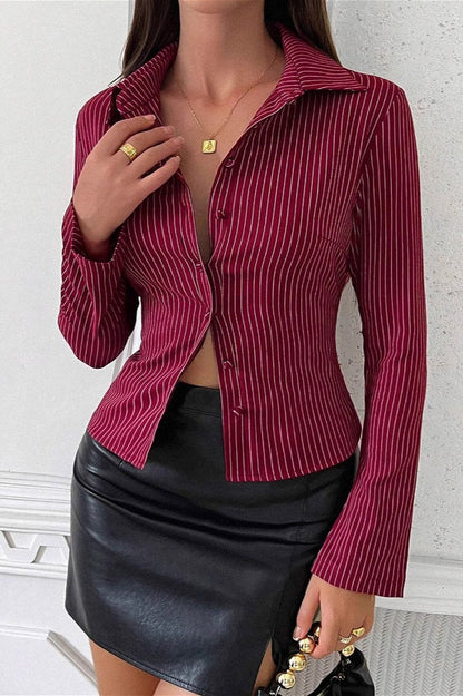 Blusa de manga larga acampanada con solapas y hebillas