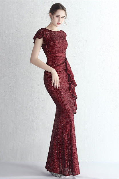 Vestido de gala de sirena con purpurina, cuello alto y abertura