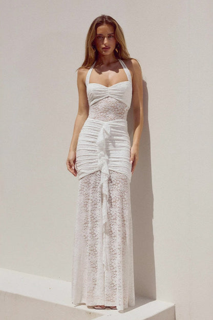 Vestido largo ajustado halter sin espalda con aberturas y encaje transparente