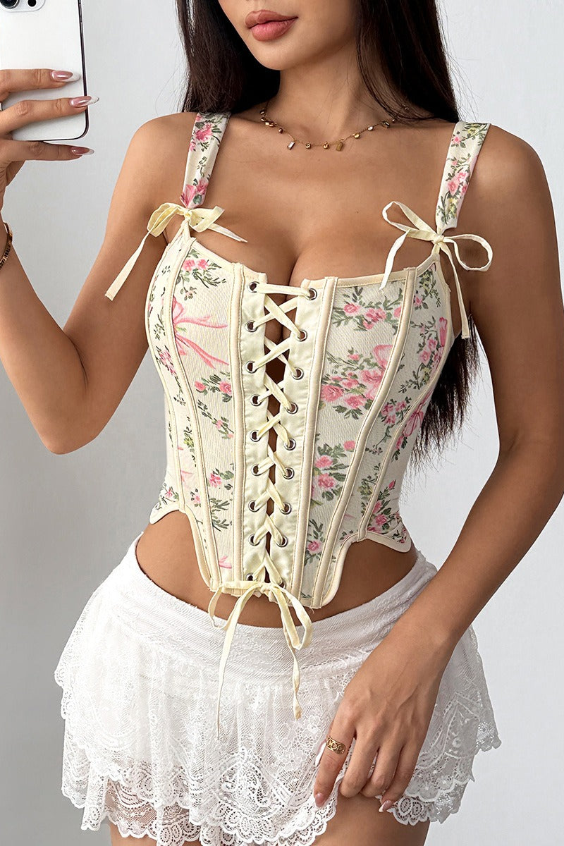 Top corto con estampado floral, varillas, lazo cruzado y lazada