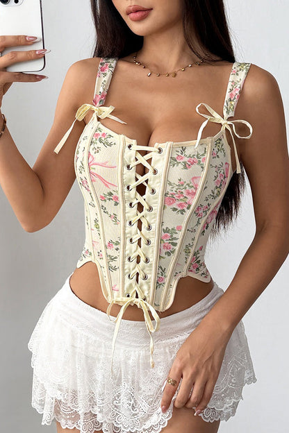 Top corto con estampado floral, varillas, lazo cruzado y lazada