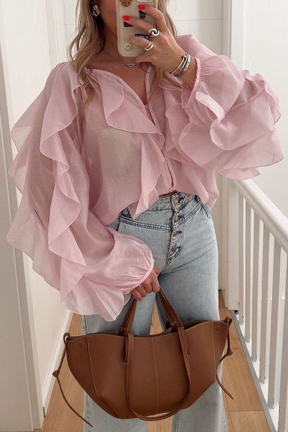Blusa de moda con cuello en V y volantes para ir a la oficina