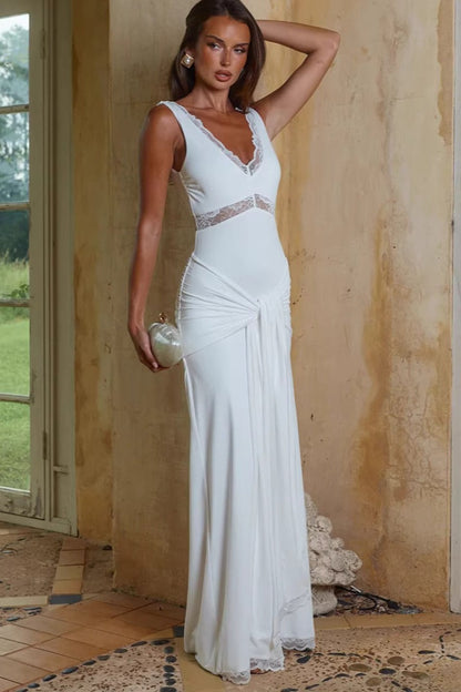 Vestido largo ceñido con paneles de encaje y tirantes anudables