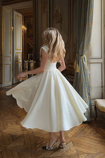 Vestido midi minimalista liso sin espalda con vuelo