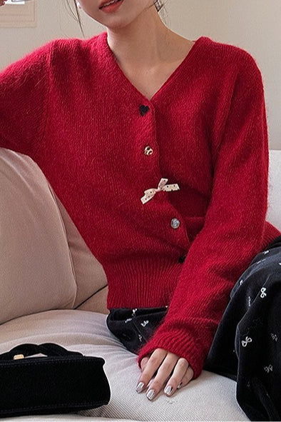 Cárdigan con botones, cuello en V y lazo decorativo