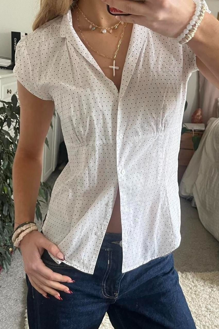 Blusa versátil a cuadros rojos y blancos
