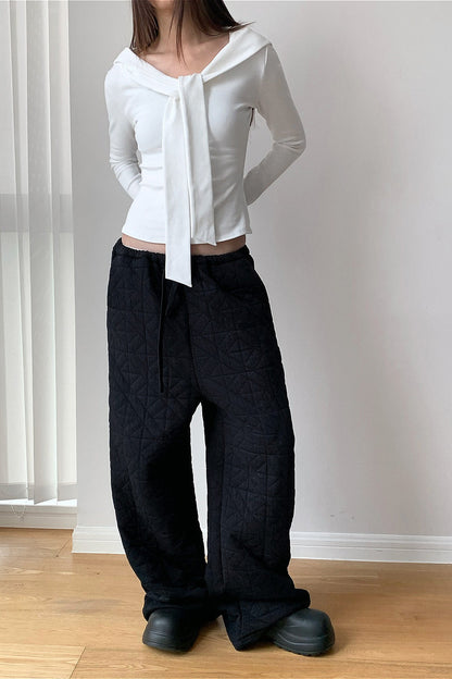 Pantalones térmicos gruesos acolchados con forma de diamante y cordón