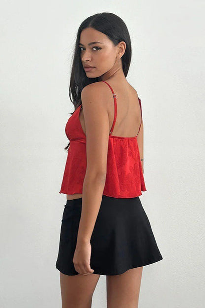 Top corsetero jacquard floral sólido escotado