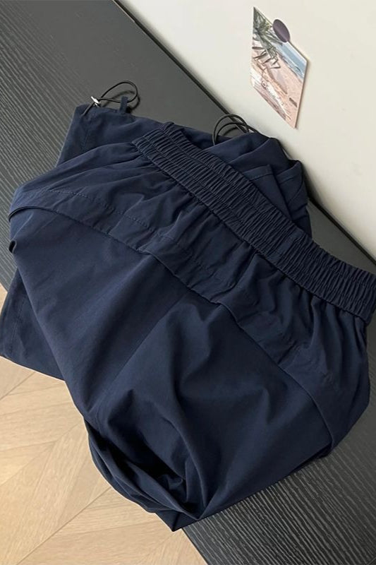 Pantalones deportivos sólidos de pierna ancha elásticos