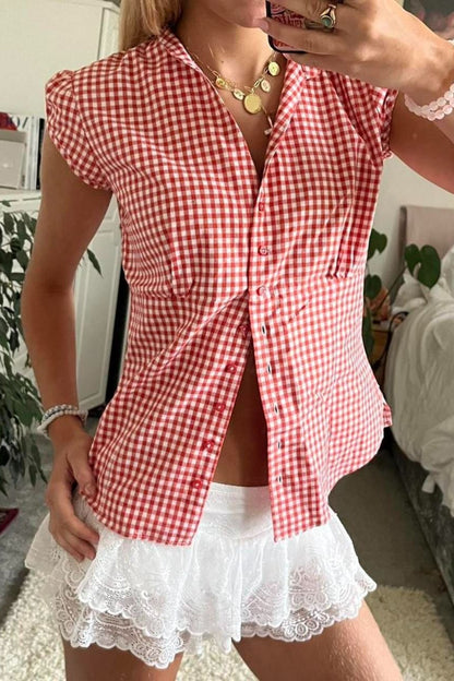 Blusa versátil a cuadros rojos y blancos