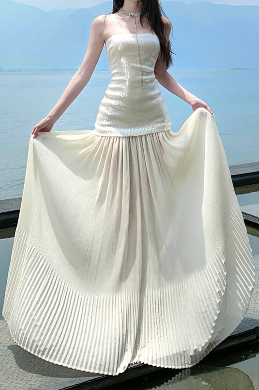 Vestido largo con lentejuelas, sin tirantes y fluido