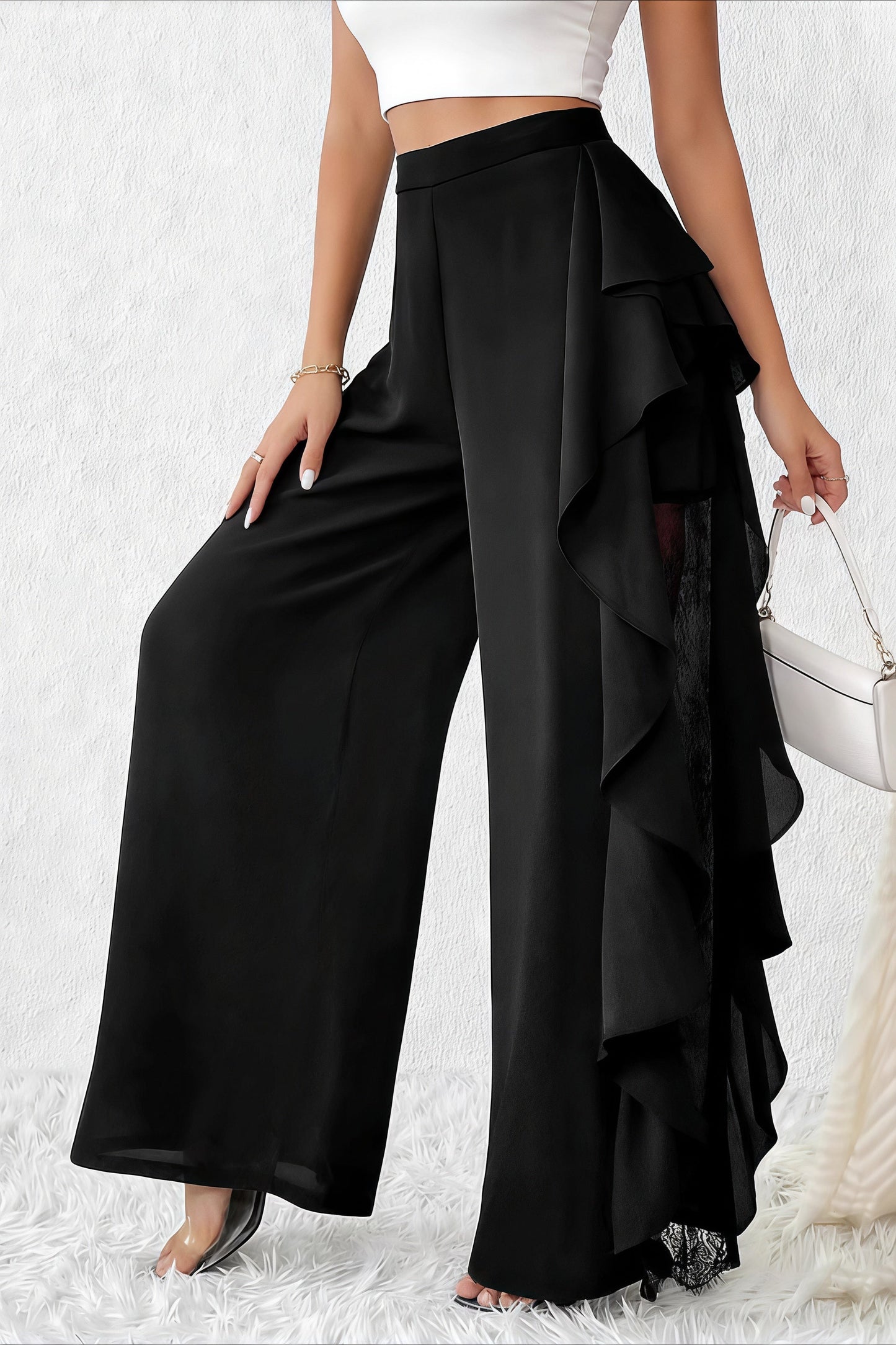 Pantalones de pernera ancha con aberturas irregulares y encaje