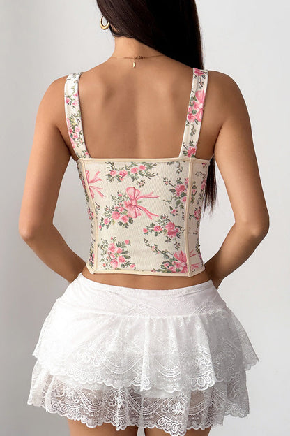 Top corto con estampado floral, varillas, lazo cruzado y lazada