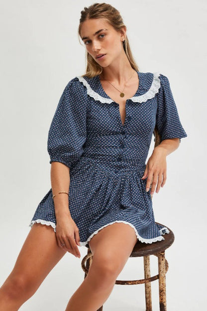 Minivestido vintage de lunares con cuello Peter Pan y mangas abullonadas