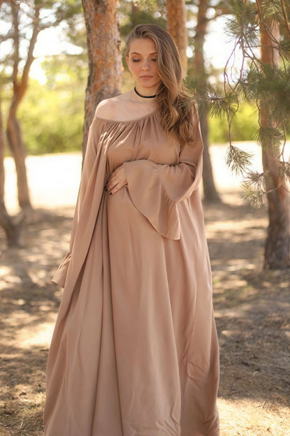 Vestido maxi suelto holgado con bajo acampanado liso