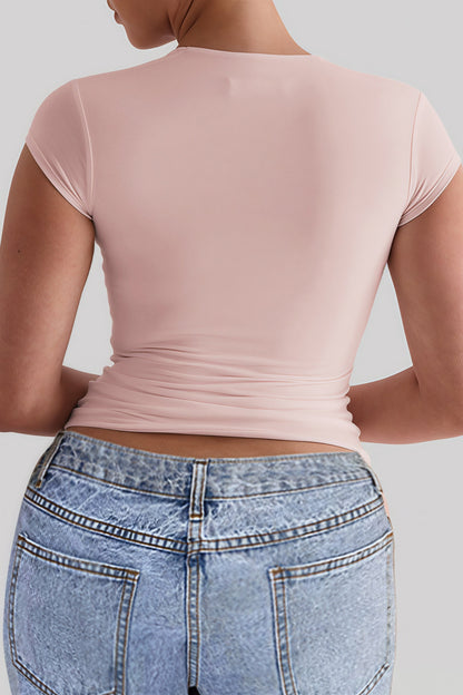 Camiseta crop ajustada con cuello redondo y sin mangas