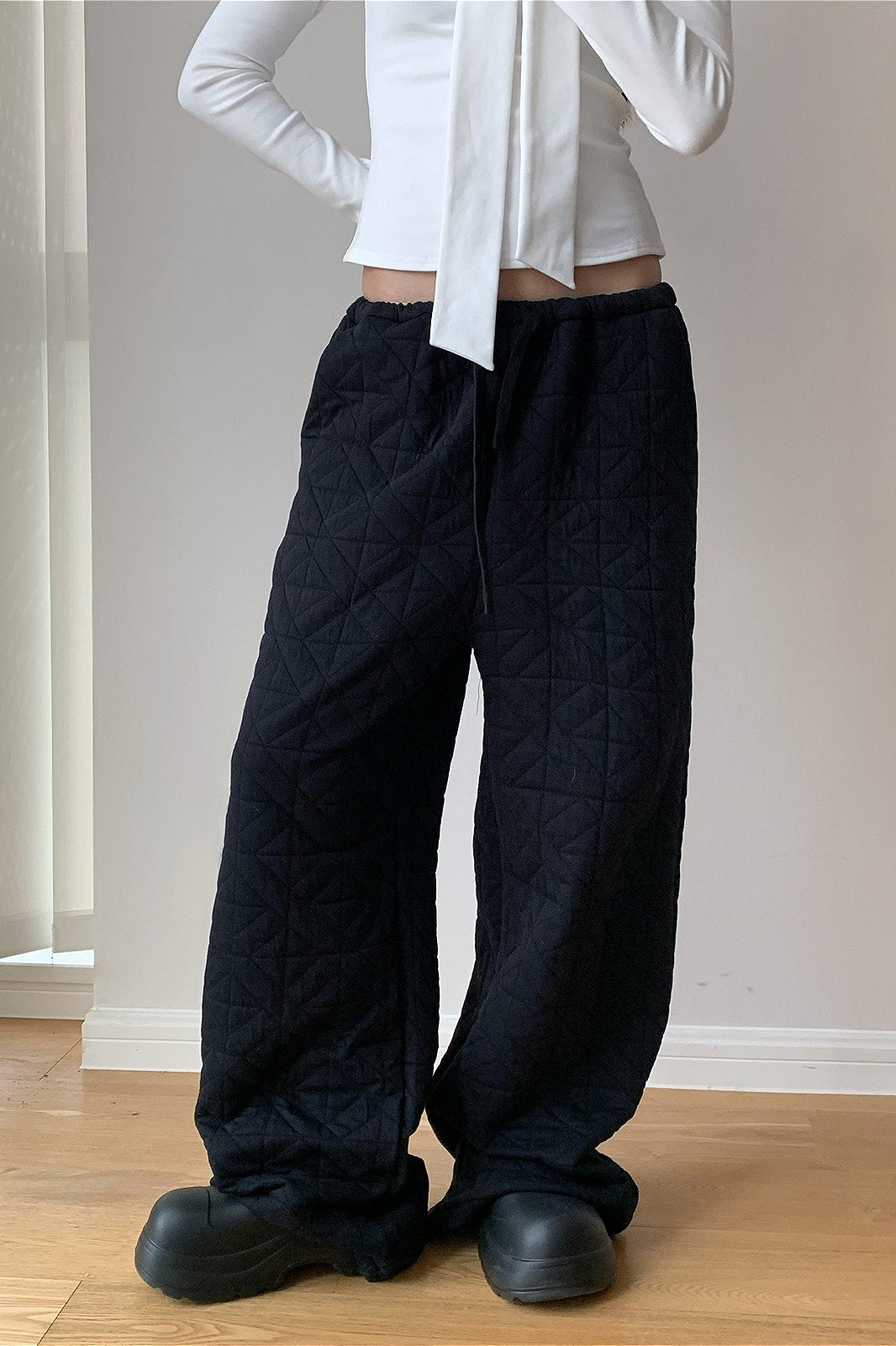 Pantalones térmicos gruesos acolchados con forma de diamante y cordón