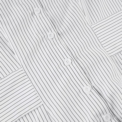 Blusa con cuello, rayas, botones y cintura anudada