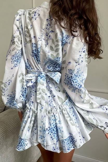 Vestido largo floral con cuello alto, mangas abullonadas y volantes