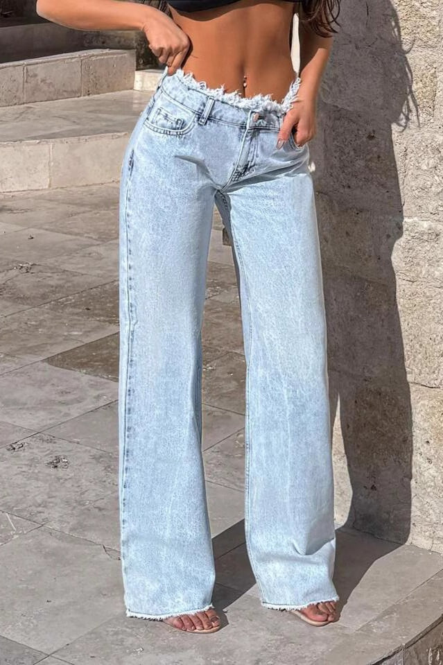 Vaqueros de pernera ancha, talle alto y bajo deshilachado