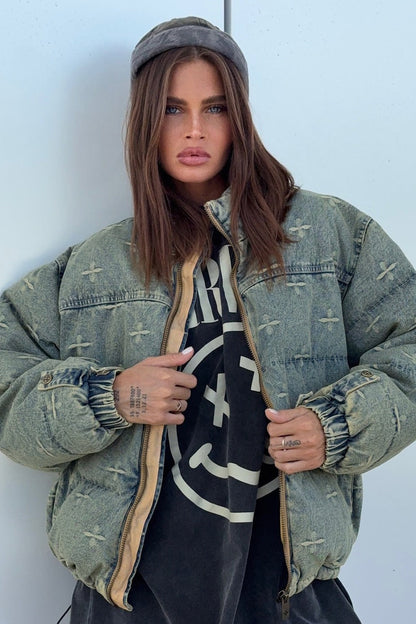 Chaqueta acolchada con bordado de cruz y efecto desgastado vintage