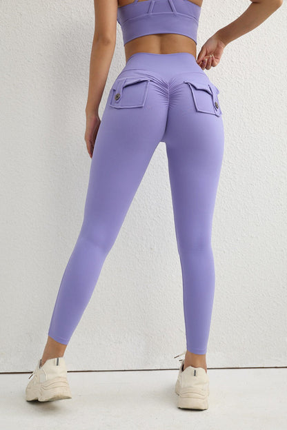 Leggings con botón utilitario de talle alto y efecto push-up