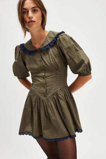 Minivestido vintage de lunares con cuello Peter Pan y mangas abullonadas