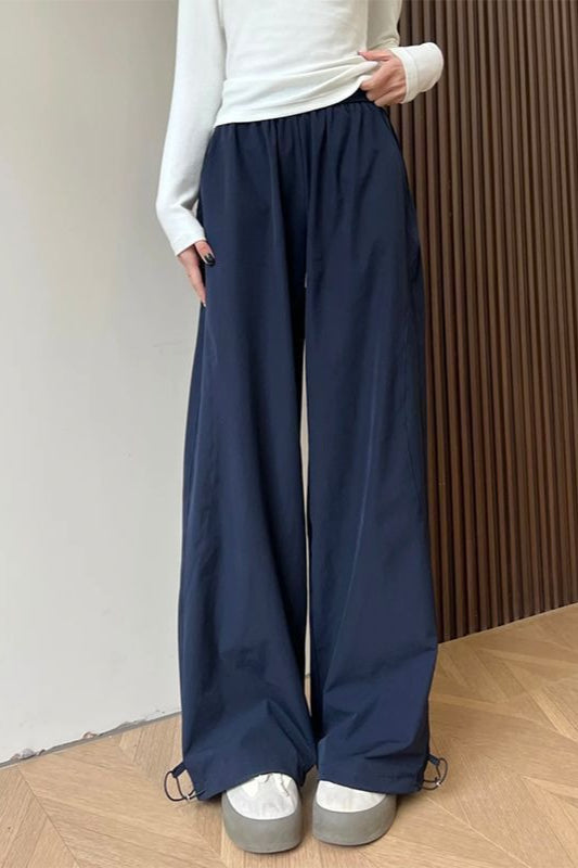 Pantalones deportivos sólidos de pierna ancha elásticos