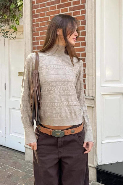 Top de punto trenzado con cuello redondo