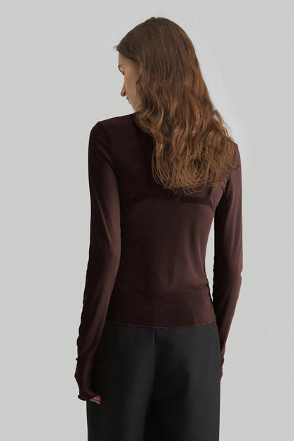 Camiseta de manga larga ajustada de malla lisa con cuello alto