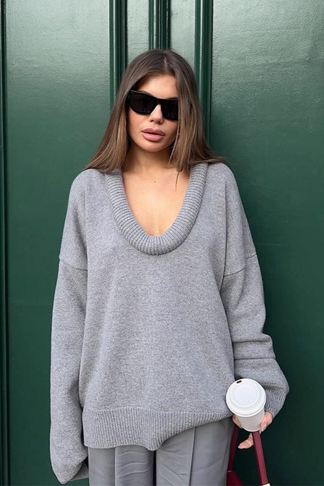Suéter sólido oversized con paneles y cuello de pico 3D
